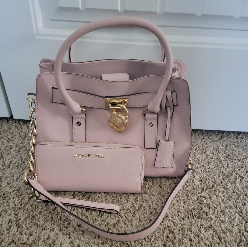 (SOLD) Authentic Michael Kors Hamilton East West with matching MK Wallet.